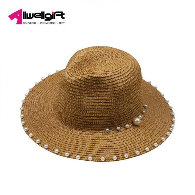 A pérola da tendência do verão perlou o chapéu exterior da praia da proteção solar das senhoras dos acessórios de forma do tampão